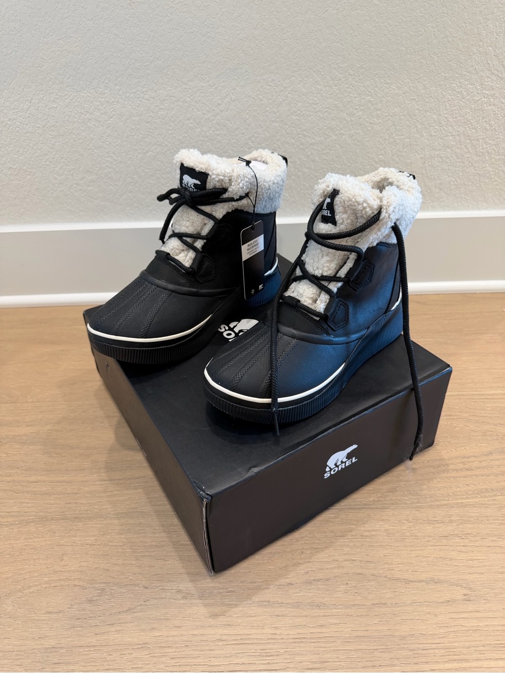 Sorel Black and White Sherpa-Trim Insulated Waterproof Boots